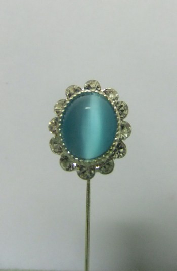 Epingle forme ronde avec grande perle bleue